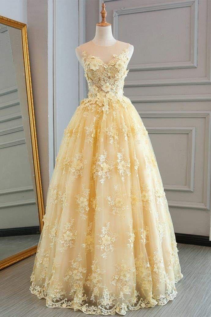 A yellow dress designed by some floral embroidery with full length to wear on any occasion.